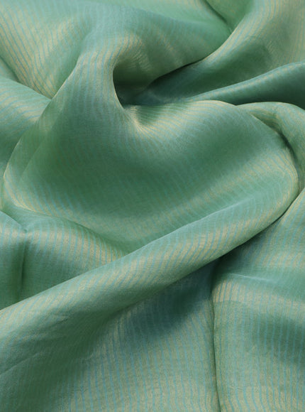 Organza crushed tissue silk saree pastel green with allover zari weaves in borderless style