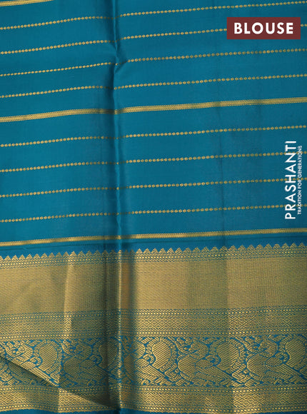 Pure kanchipuram silk saree orange and cs blue with allover zari weaves & buttas and annam zari woven korvai border