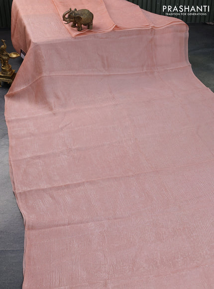 Organza crushed tissue silk saree peach orange and elephant grey with plain body in borderless style