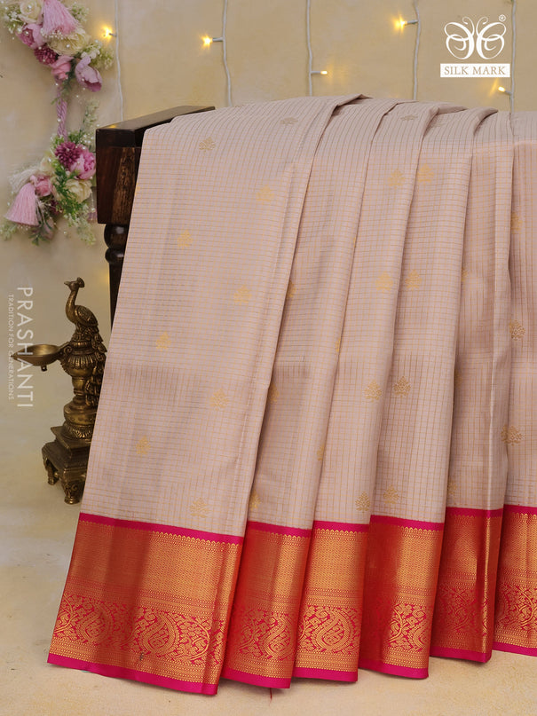 Pure kanchipuram silk saree beige and pink with allover zari checks & buttas and zari woven korvai border