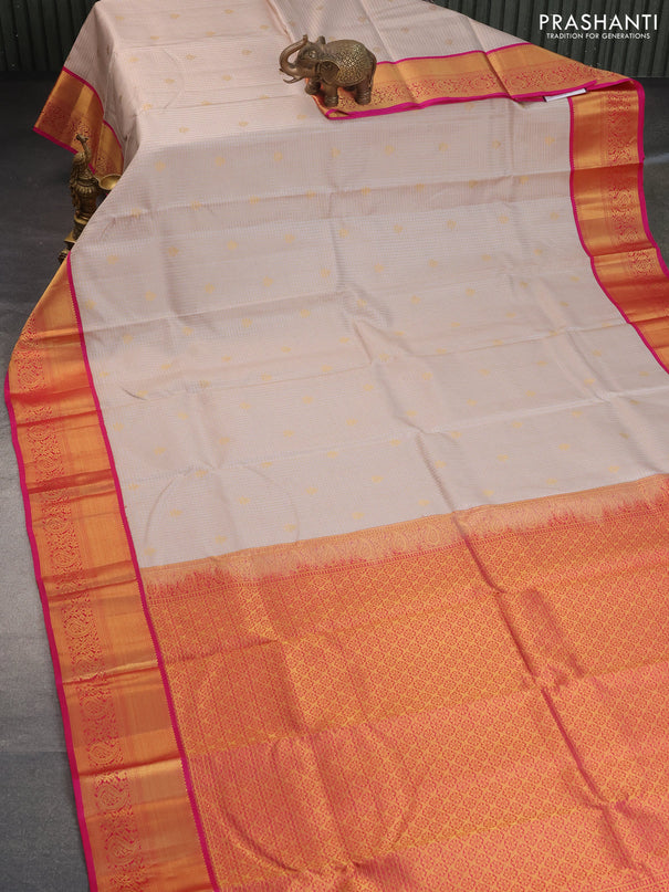 Pure kanchipuram silk saree beige and pink with allover zari checks & buttas and zari woven korvai border