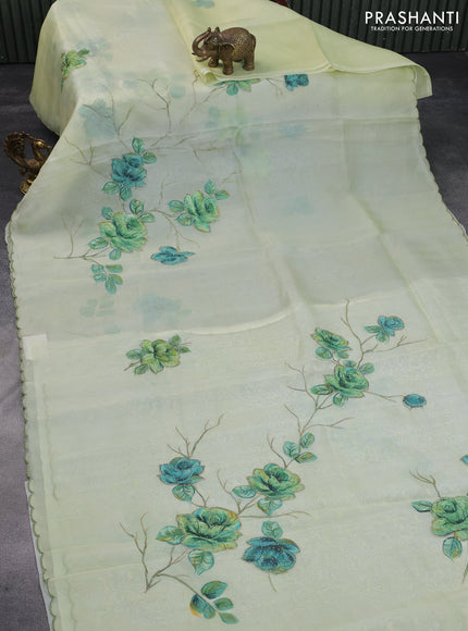 Pure organza silk saree pista green with floral prints & beaded work and beaded work border