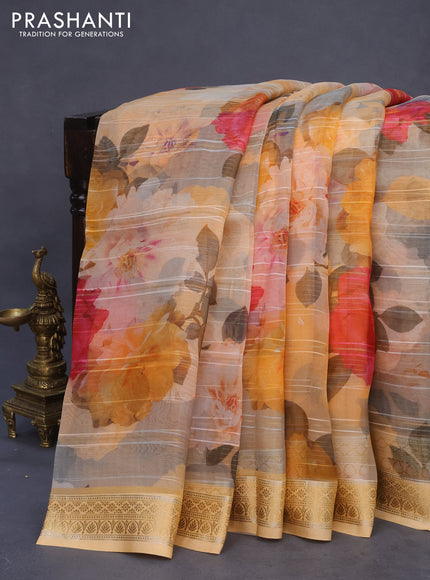 Pure organza silk saree orange with allover floral digital prints and zari woven border