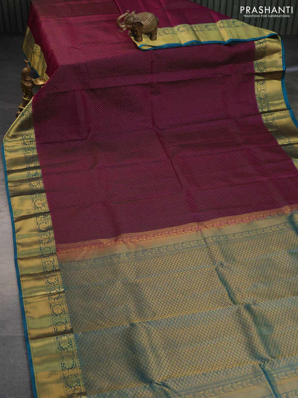 Pure kanchipuram silk saree purple and peacock blue with self emboss & zari weaves and floral zari woven border