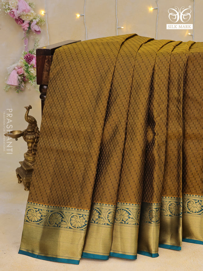 Pure kanchipuram silk saree mehendi green and peacock blue with self emboss & zari weaves and floral zari woven border