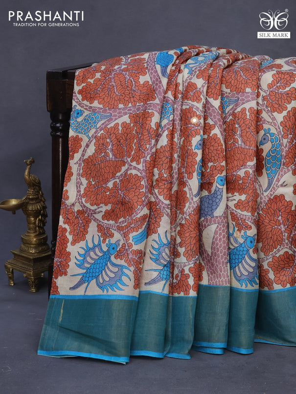 Pure tussar silk saree cream and cs blue with allover prints & mirror work and zari woven border