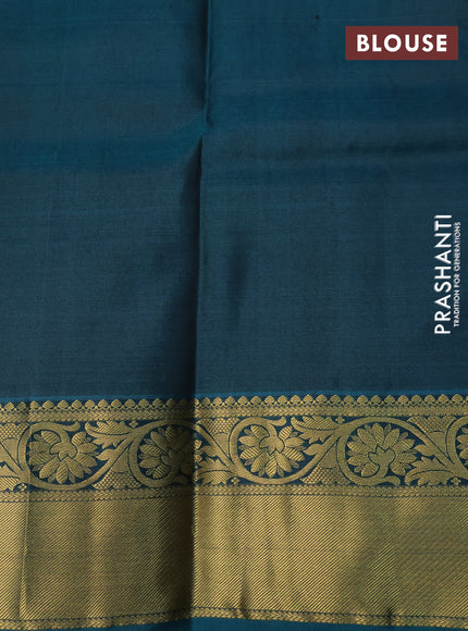 Pure kanchipuram silk saree mehendi green and peacock blue with self emboss & zari weaves and floral zari woven border