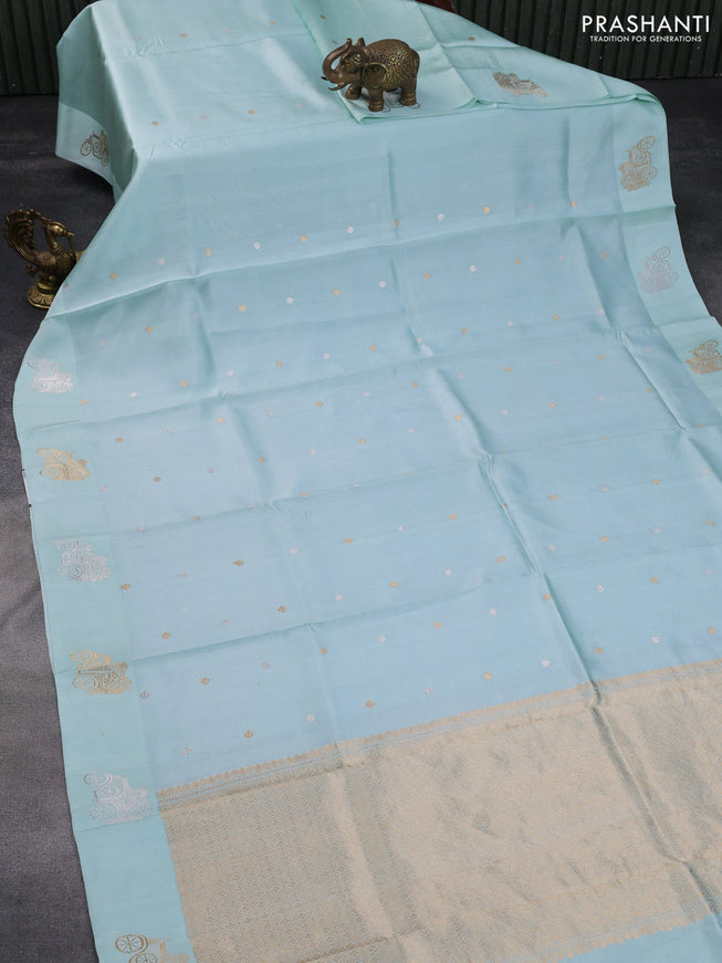 Poona silk saree light blue shade with zari woven buttas and zari woven butta border