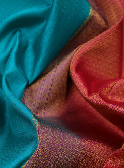 Pure kanchipuram silk saree teal blue and pink with allover self emboss and zari woven border