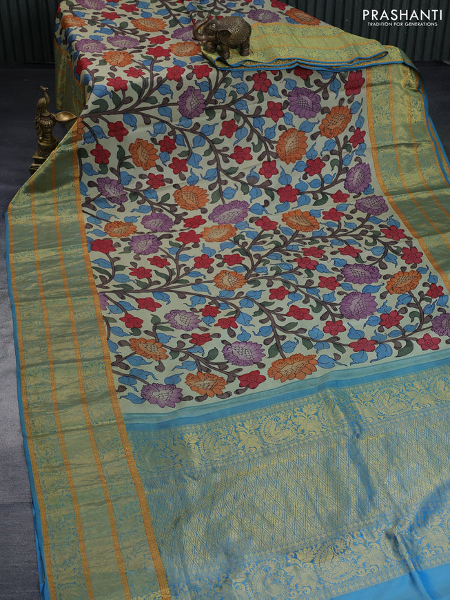 Pure kanchipuram silk saree pastel green shade and blue with allover pen kalamkari hand painted prints and long rich zari woven border