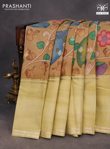 Pure kanchipuram silk saree sandal and pista green with allover pen kalamkari hand painted prints and long silver zari woven border