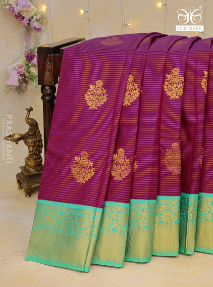 Pure kanchipuram silk saree purple and teal green shade with allover zari strips & buttas and floral zari woven korvai border