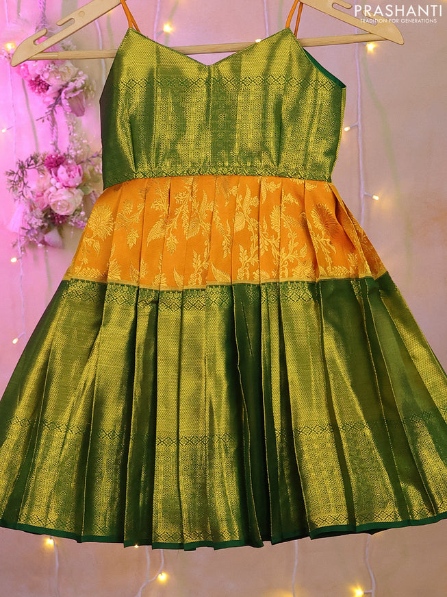 Silk kids lehenga green and mango yellow and zari woven brocade weaves and long zari woven border for 0-1 years