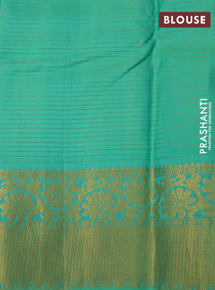 Pure kanchipuram silk saree purple and teal green shade with allover zari strips & buttas and floral zari woven korvai border