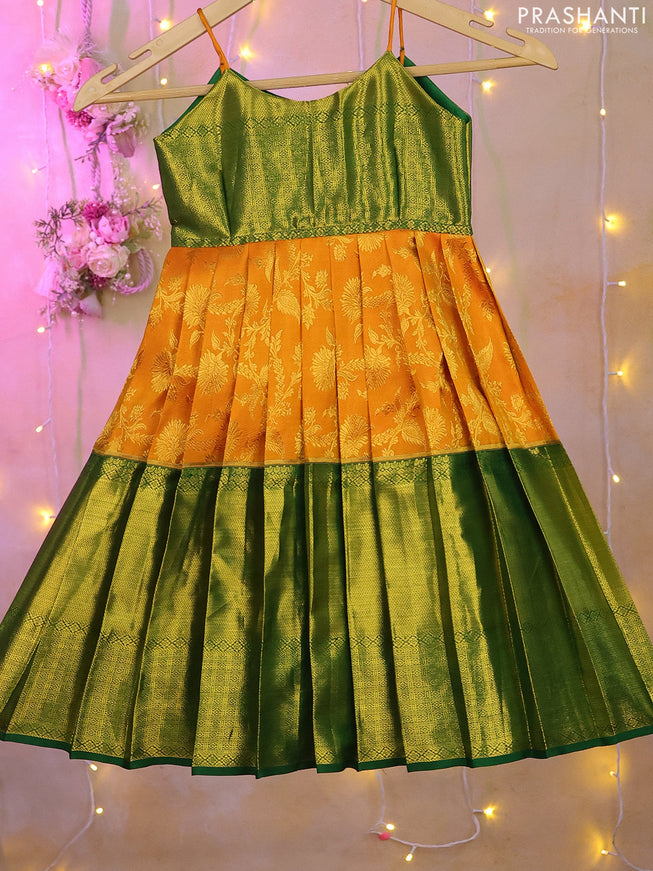 Silk kids frock green and mango yellow with zari woven brocade weaves and long zari woven border for 0-1 years