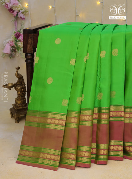 Pure kanchipuram silk saree parrot green and dual shade of pink with zari woven annam buttas and rettapet long zari woven border