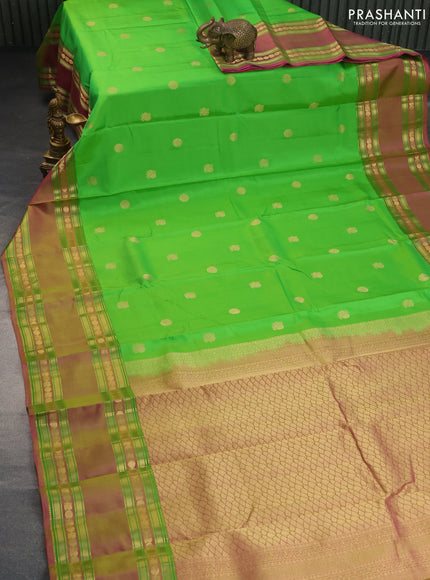 Pure kanchipuram silk saree parrot green and dual shade of pink with zari woven annam buttas and rettapet long zari woven border