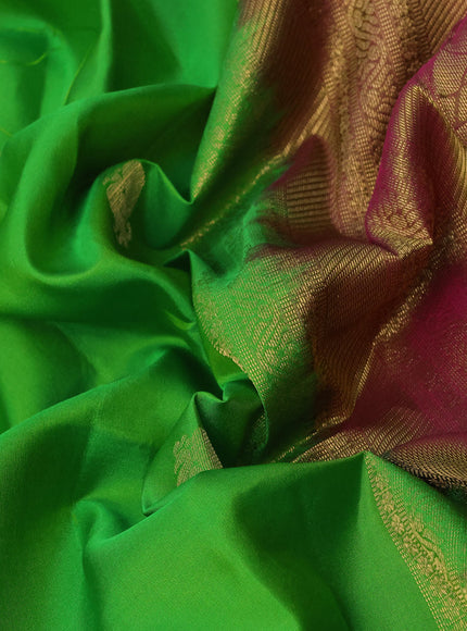 Pure kanchipuram silk saree parrot green and dual shade of pink with zari woven annam buttas and rettapet long zari woven border