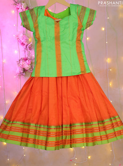 Silk kids lehenga green and orange with simple neck pattern and temple design zari woven border for 5-6 years