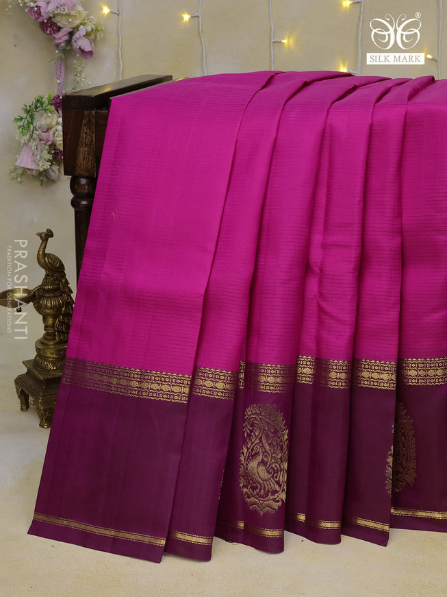 Pure kanchipuram silk saree pink and purple with strips pattern and rettapet long zari woven butta border