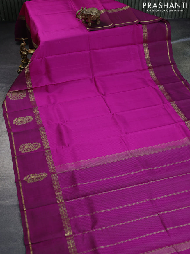 Pure kanchipuram silk saree pink and purple with strips pattern and rettapet long zari woven butta border