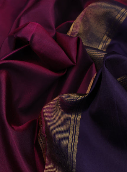 Pure kanchipuram silk saree dark magenta and navy blue with plain body and rettapet long zari woven border