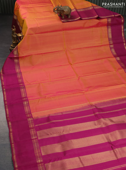 Pure kanchipuram silk saree dual shade of pinkish orange and magenta pink with plain body and rettapet long zari woven border