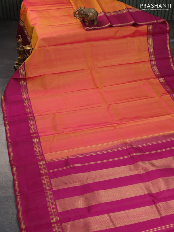 Pure kanchipuram silk saree dual shade of pinkish orange and magenta pink with plain body and rettapet long zari woven border