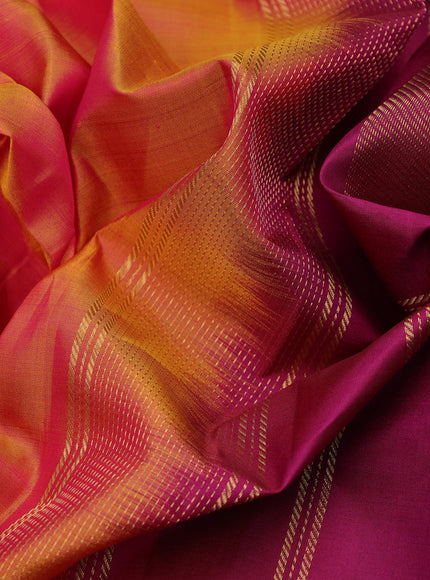 Pure kanchipuram silk saree dual shade of pinkish orange and magenta pink with plain body and rettapet long zari woven border