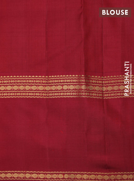 Pure kanchipuram silk saree orange and maroon with plain body and rettapet long zari woven border