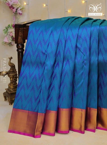 Pure kanchipuram silk saree blue and purple with allover self emboss and zari woven border