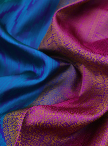 Pure kanchipuram silk saree blue and purple with allover self emboss and zari woven border