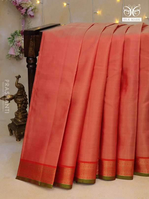 Pure kanchipuram silk saree orange and green with plain body and zari woven border