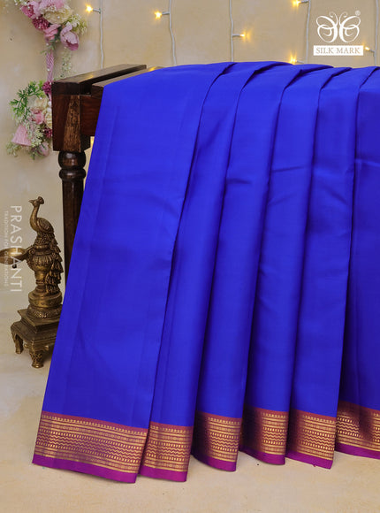 Pure kanchipuram silk saree royal blue and dual shade of purple with plain body and zari woven border