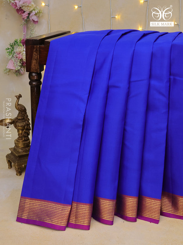 Pure kanchipuram silk saree royal blue and dual shade of purple with plain body and zari woven border