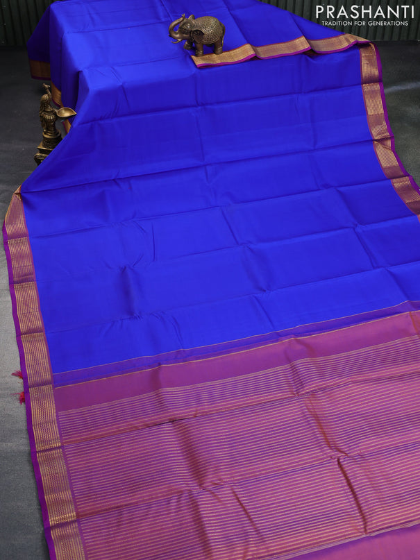 Pure kanchipuram silk saree royal blue and dual shade of purple with plain body and zari woven border