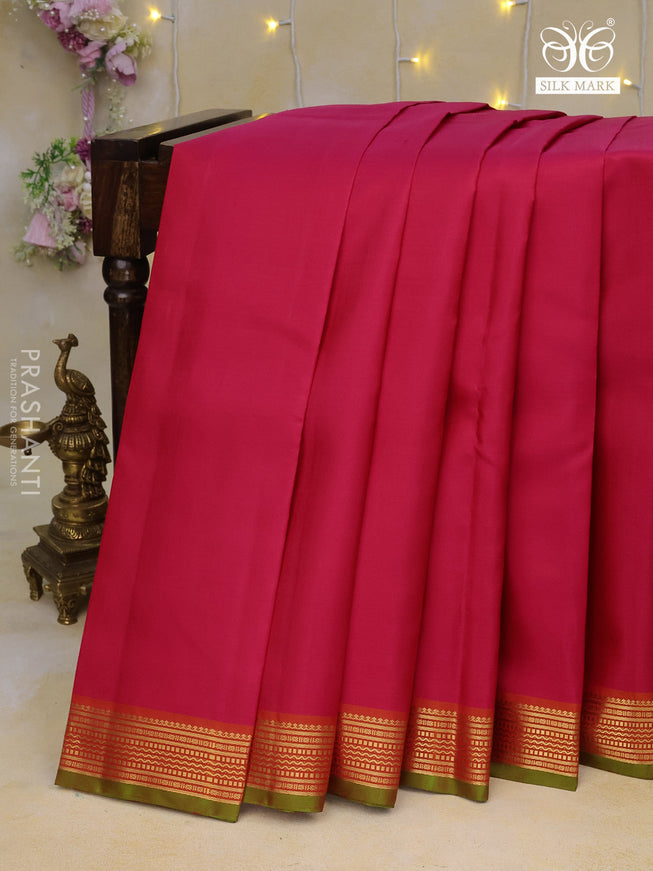 Pure kanchipuram silk saree pink and orange with plain body and zari woven border