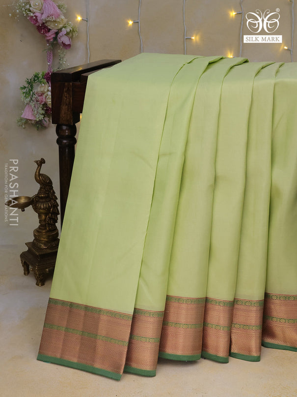 Pure kanchipuram silk saree pista green and dual shade of pink with plain body and zari woven border