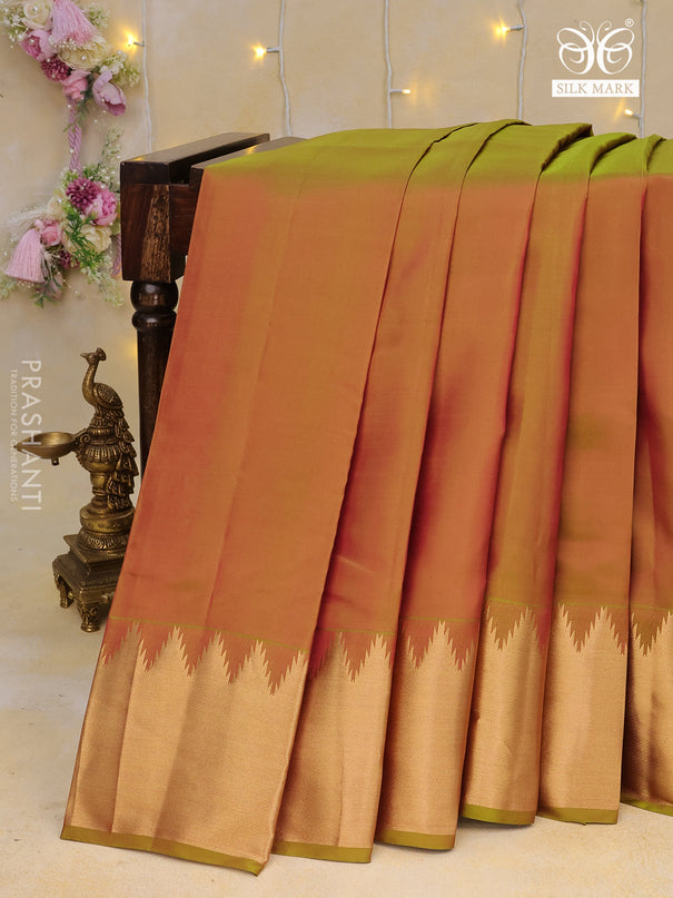 Pure kanchipuram silk saree dual shade of pinkish green with plain body and temple design zari woven border