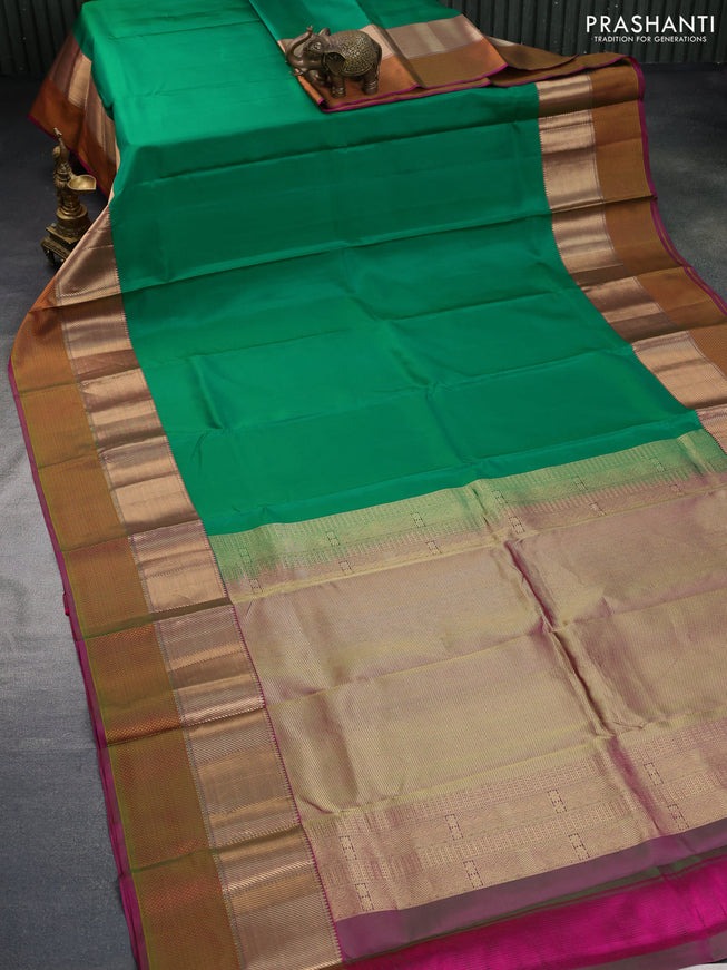 Pure kanchipuram silk saree green and dual shade of pink with plain body and zari & thread woven border