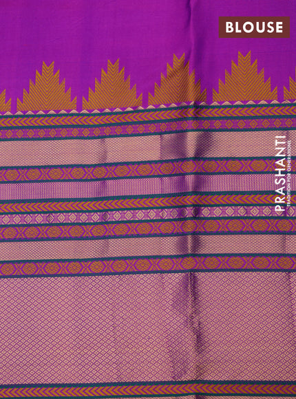 Pure kanchipuram silk saree navy blue and purple with plain body and temple design long zari woven border