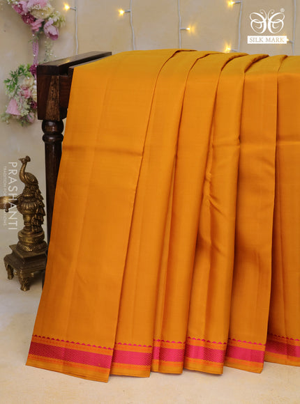 Pure kanchipuram silk saree mustard yellow with plain body and thread woven border