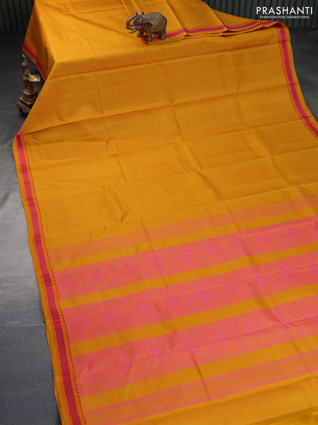 Pure kanchipuram silk saree mustard yellow with plain body and thread woven border