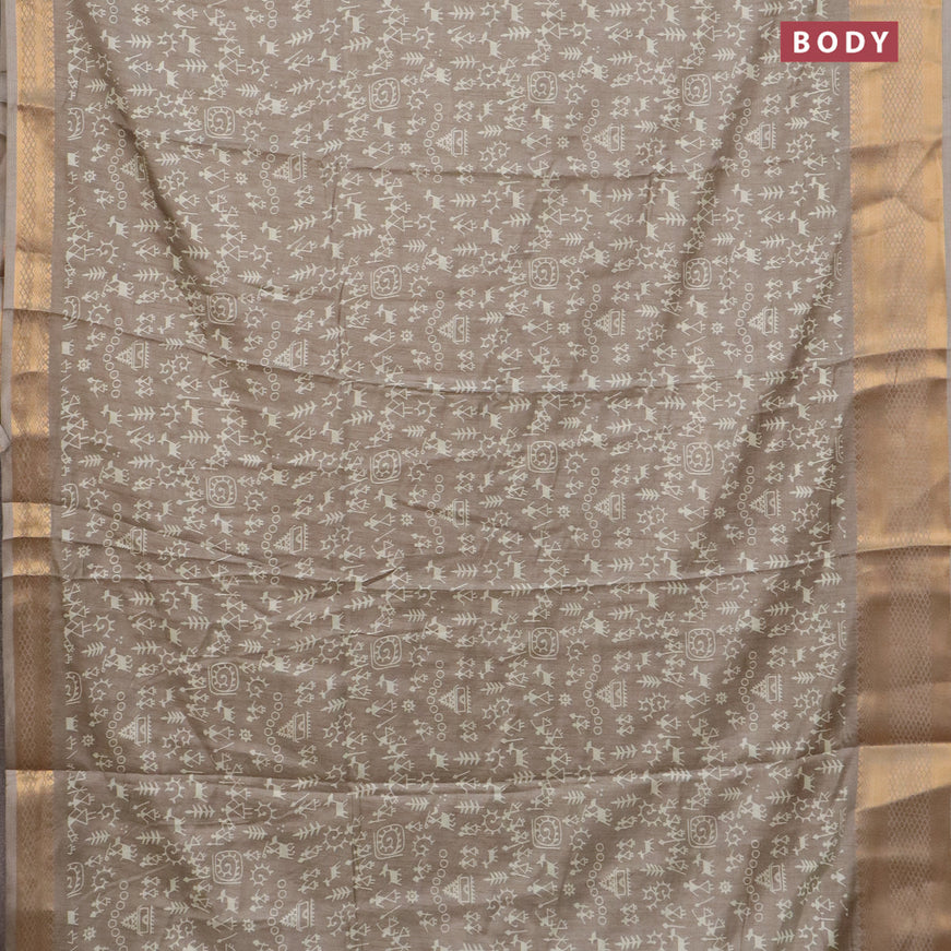 Semi dola saree grey shade with allover warli prints and zari woven border