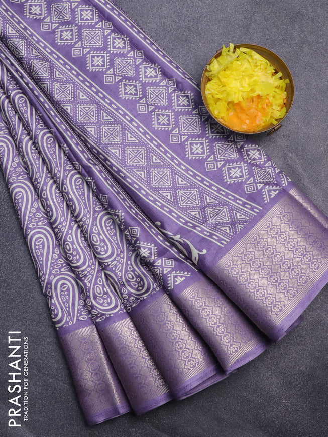 Semi dola saree pastel lavender with allover prints and zari woven border