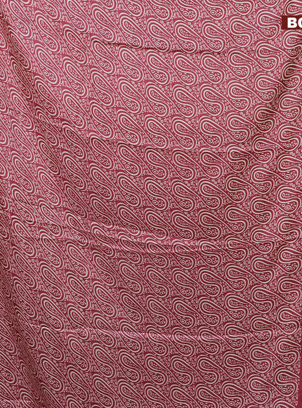 Semi dola saree onion pink with allover prints and zari woven border