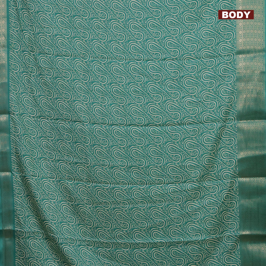 Semi dola saree teal green with allover prints and zari woven border