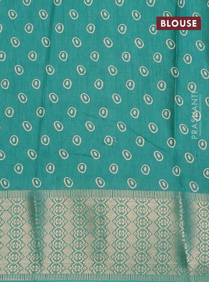 Semi dola saree teal green with allover prints and zari woven border