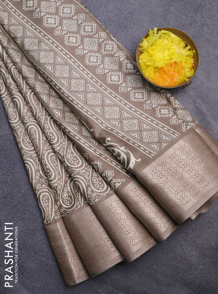 Semi dola saree grey shade with allover prints and zari woven border