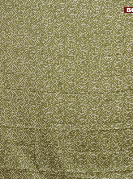 Semi dola saree green with allover prints and zari woven border